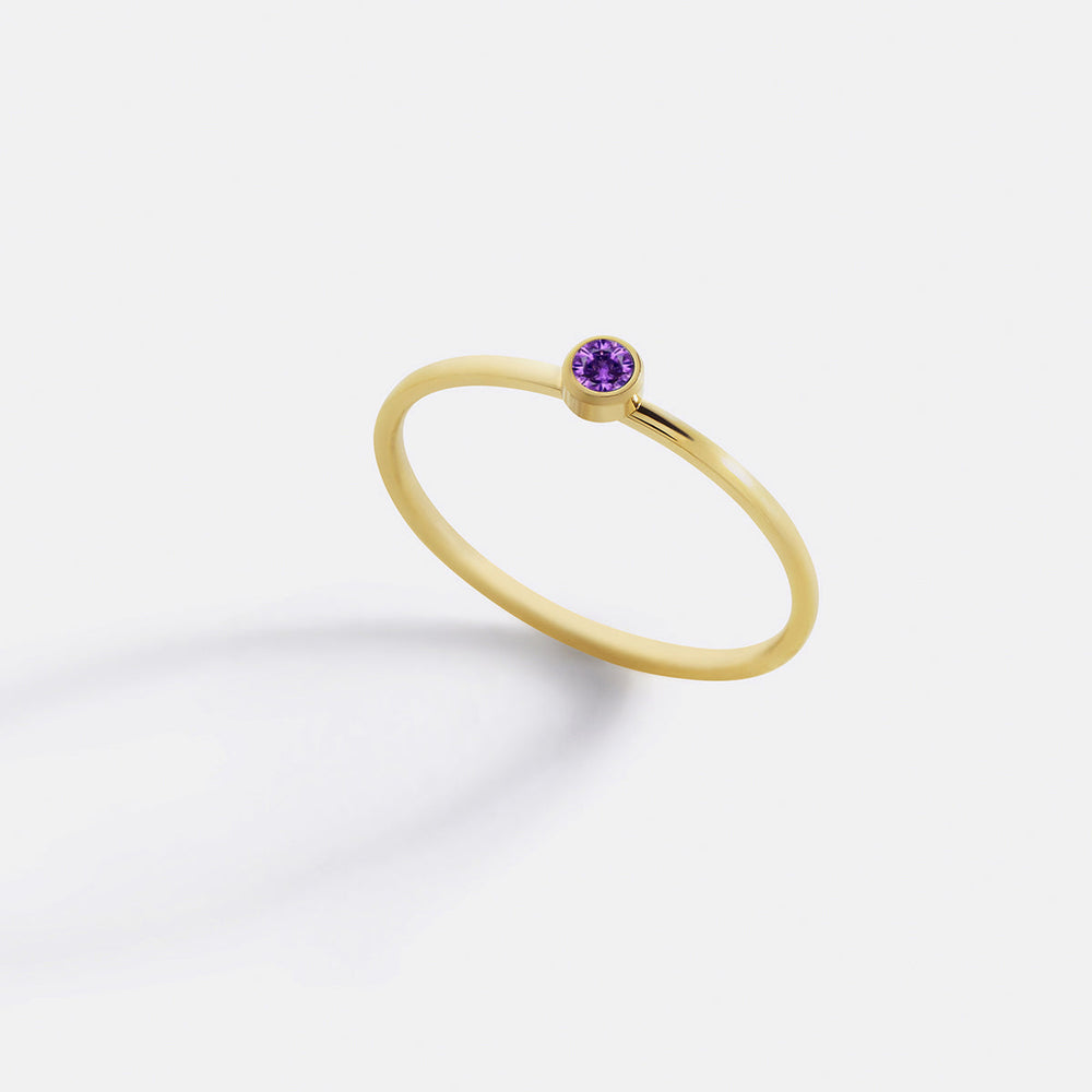 https://cdn.shopify.com/s/files/1/1342/2527/files/Minimalist_birthstone_stacking_band_1-june-gold.jpg?v=1731512372
