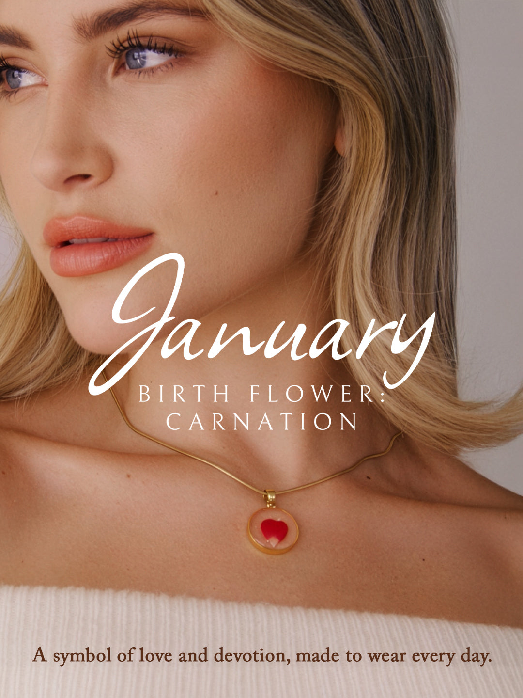 Woman wearing a necklace with a red pendant, text about January birth flower and symbol.