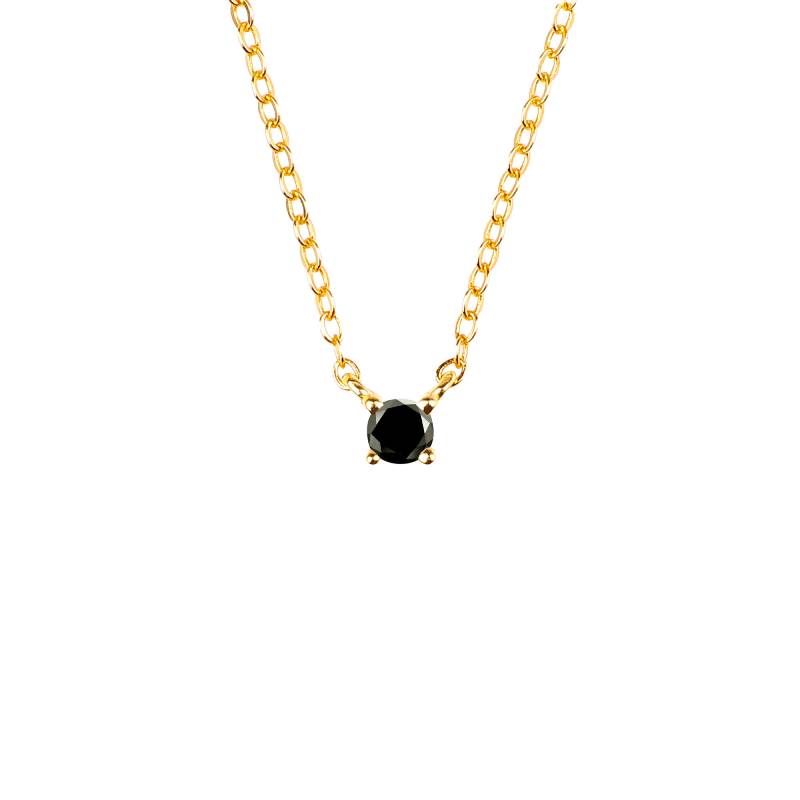 A dainty diamond necklace with a central onyx pendant, set in a gold-tone setting on a sterling silver chain.