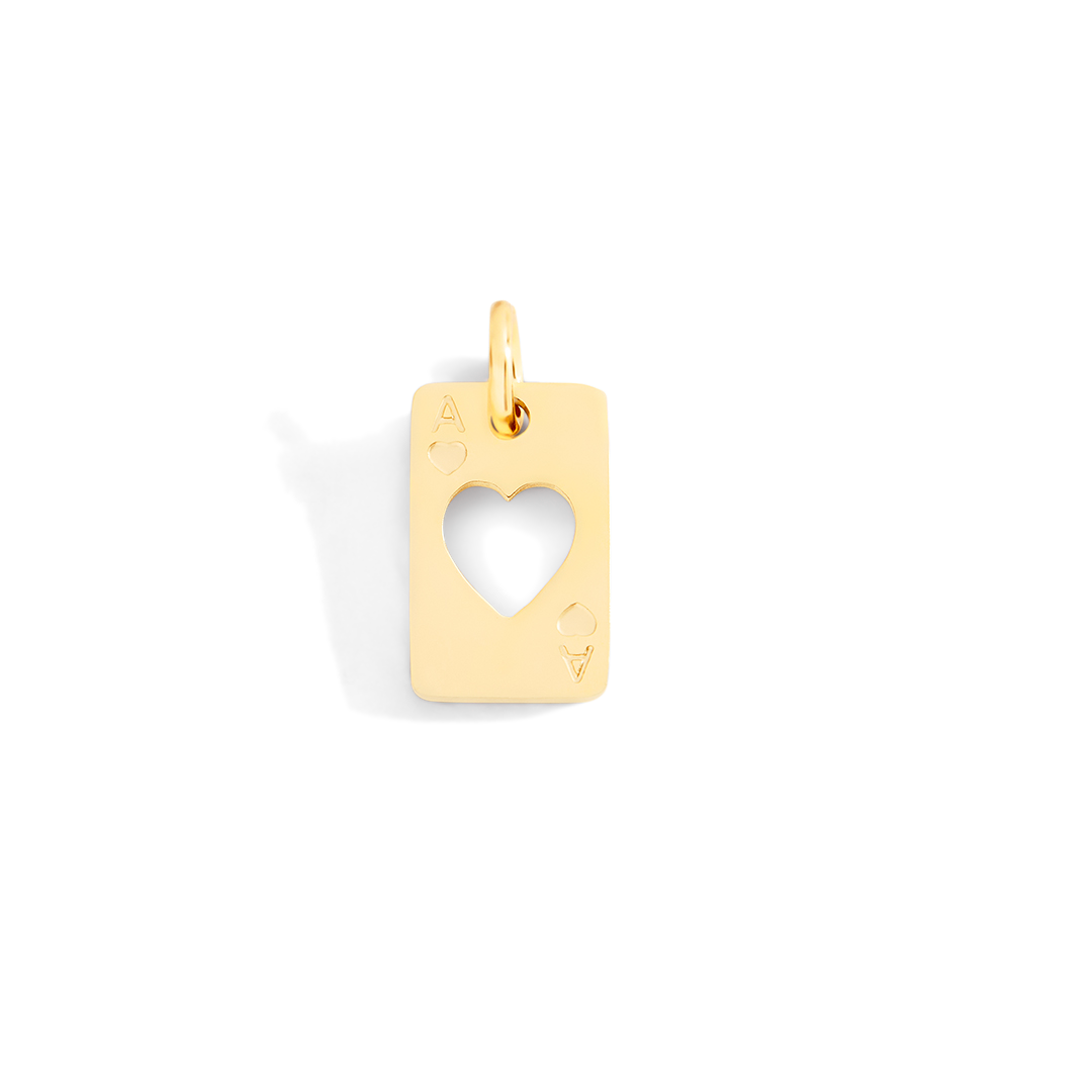 Gold pendant with a heart cutout on a light gray background