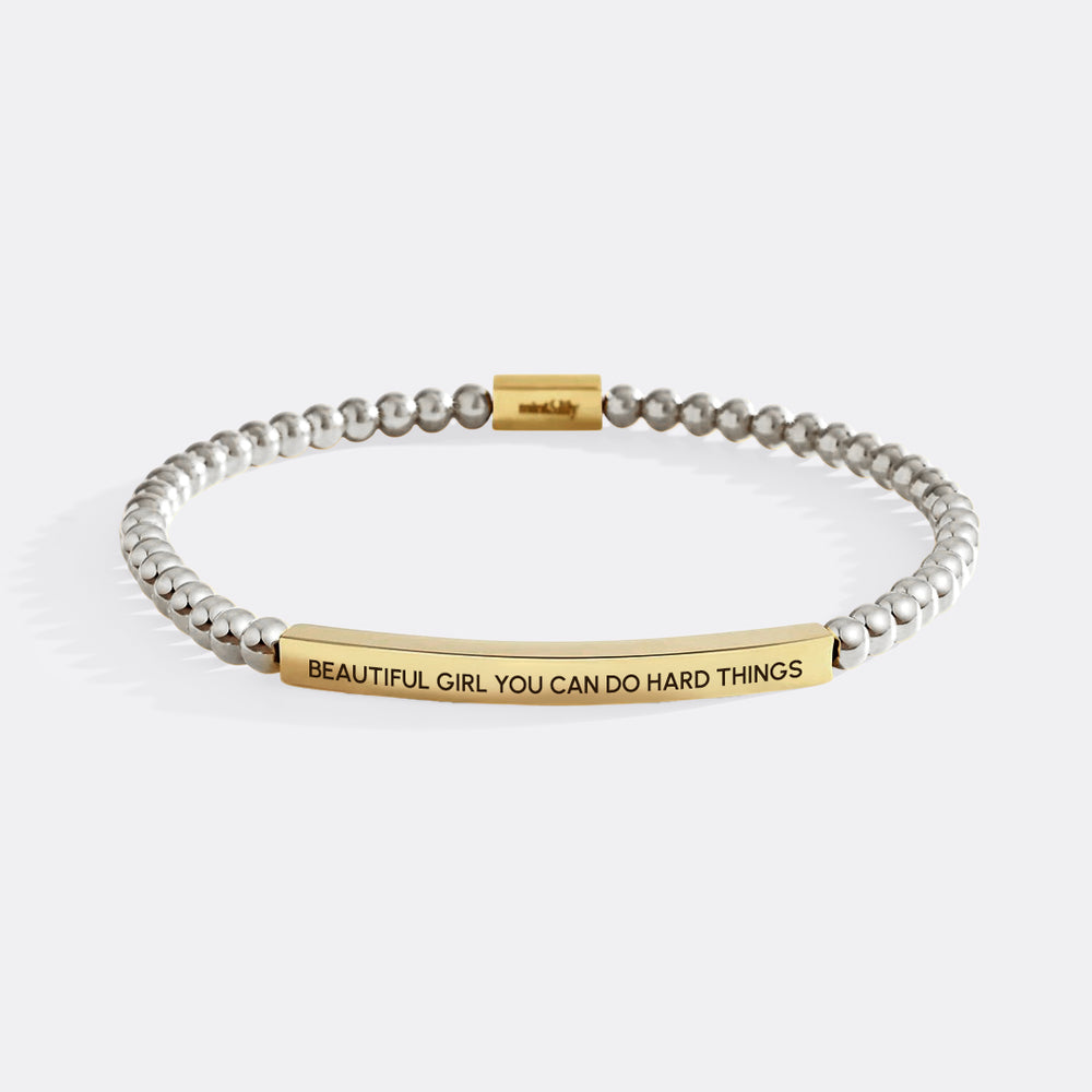 Bracelet with motivational message on a white background