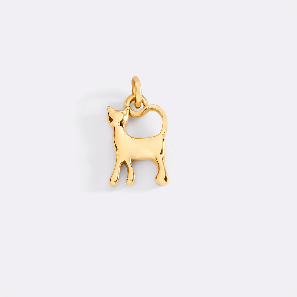Gold cat-shaped pendant on a light gray background