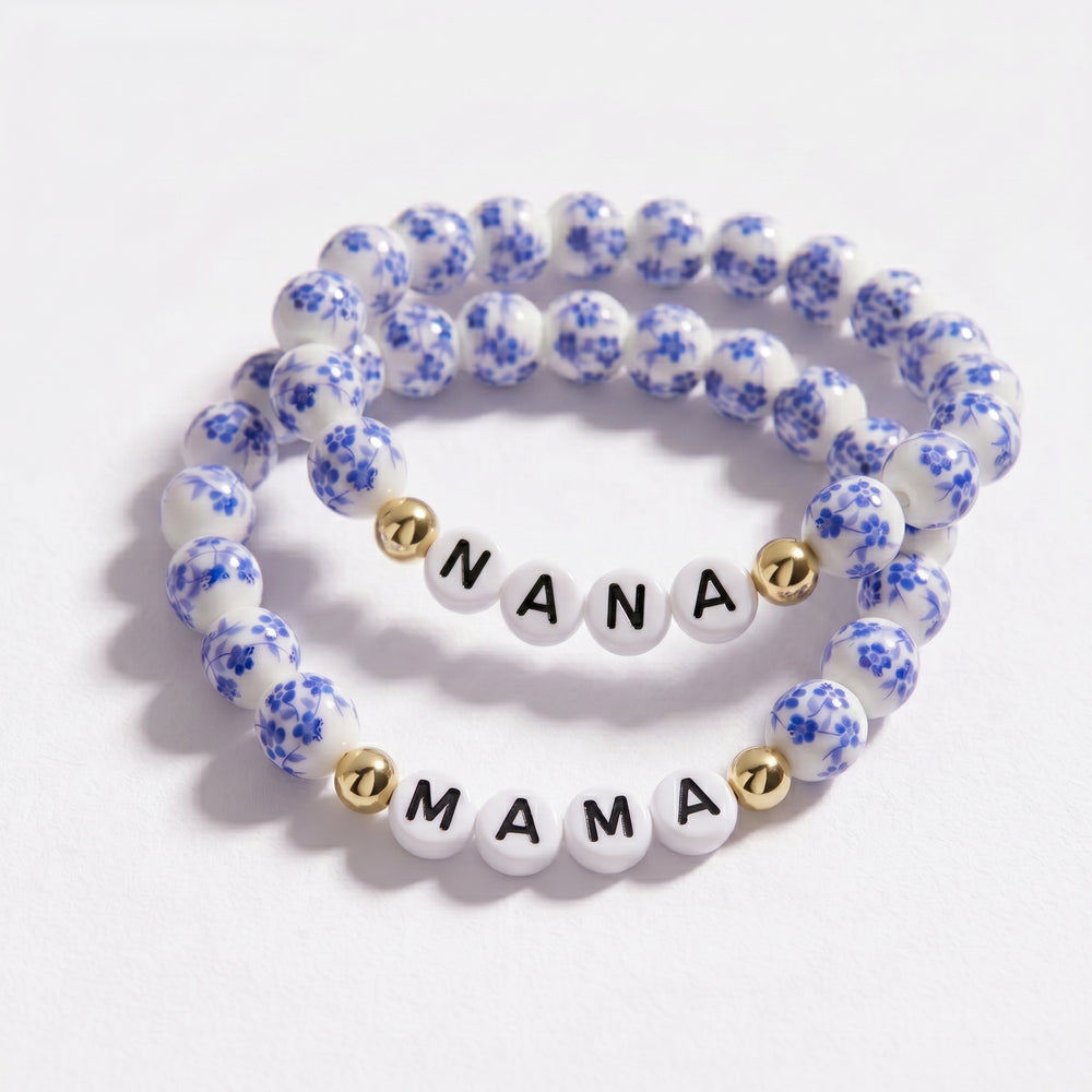 Set of three floral-patterned beaded bracelets with 'Nana' and 'Mama' charms on a white background