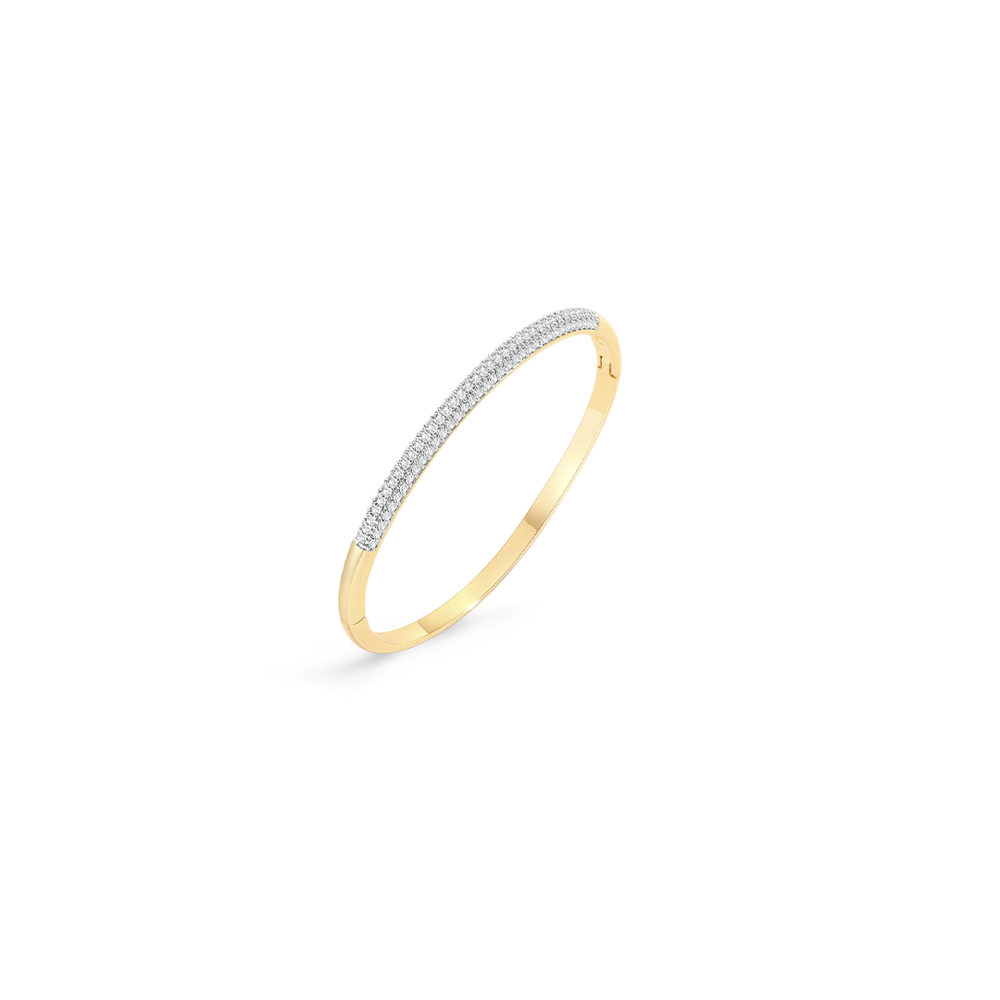 Gold ring with embedded diamonds on a light gray background