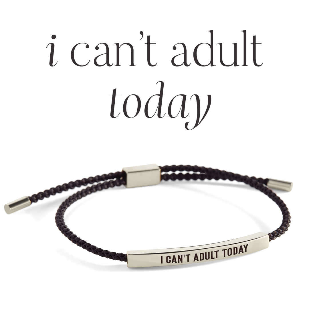 Bracelet with 'I CAN'T ADULT TODAY' text on a light gray background