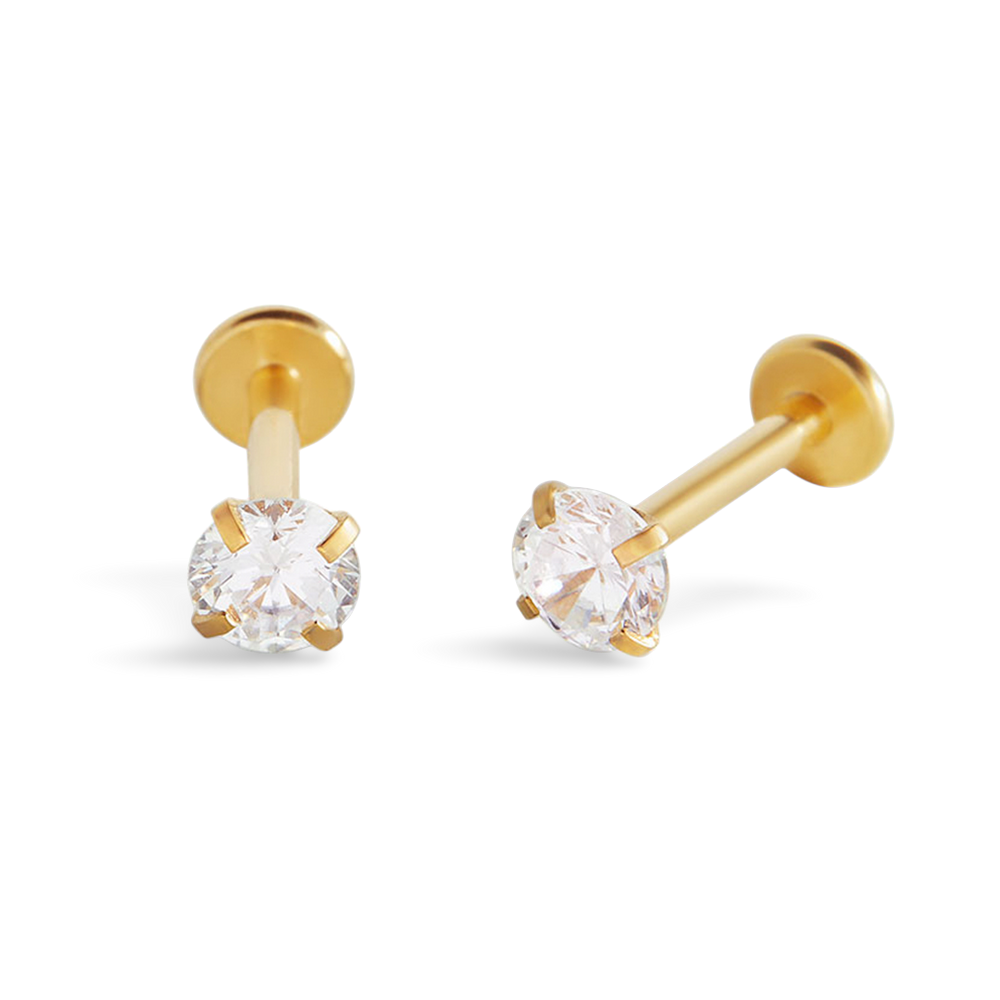 A pair of 18g flatback sleeper stud earrings with cubic zirconia stones, displayed against a black background.