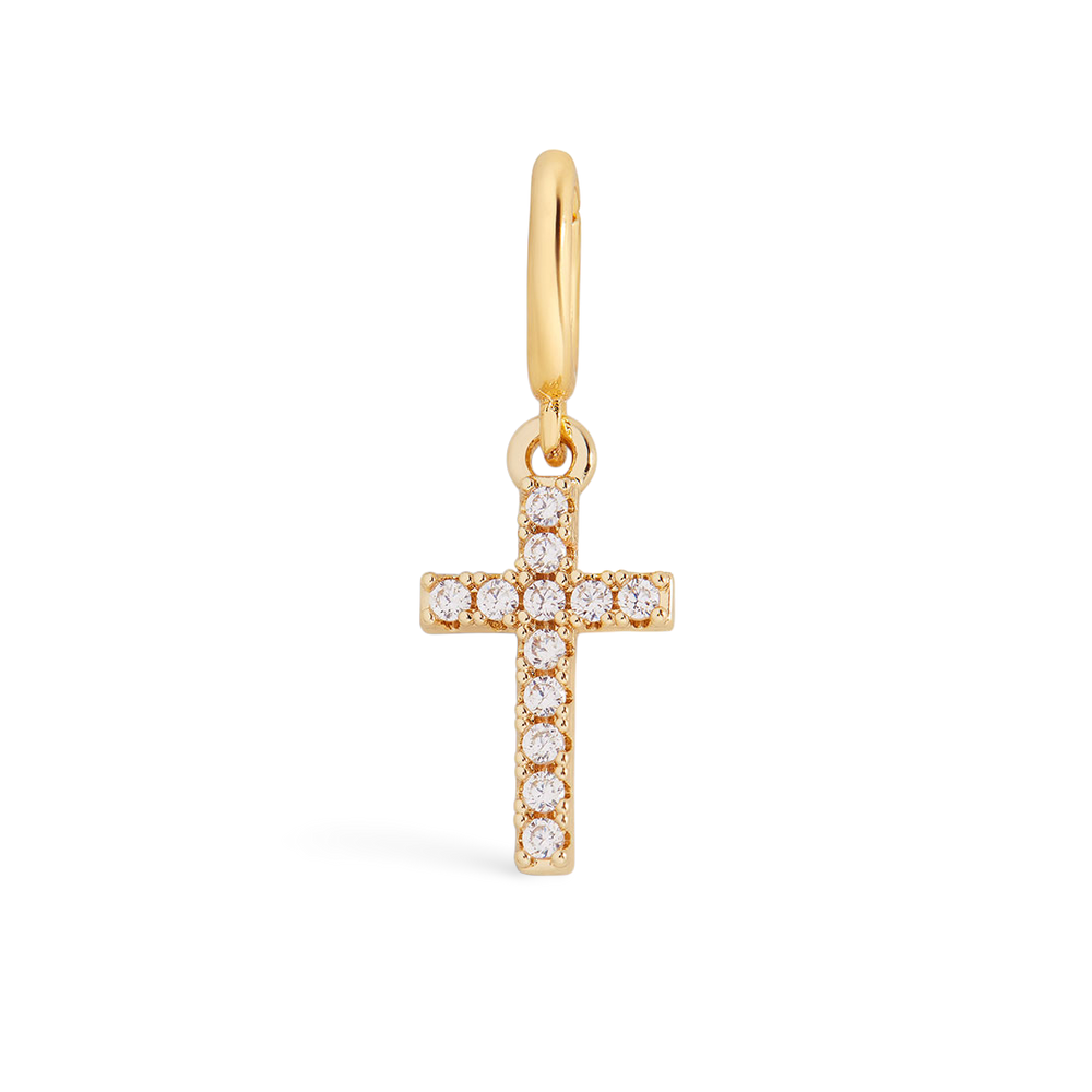 Gold cross pendant with clear stones on a light gray background