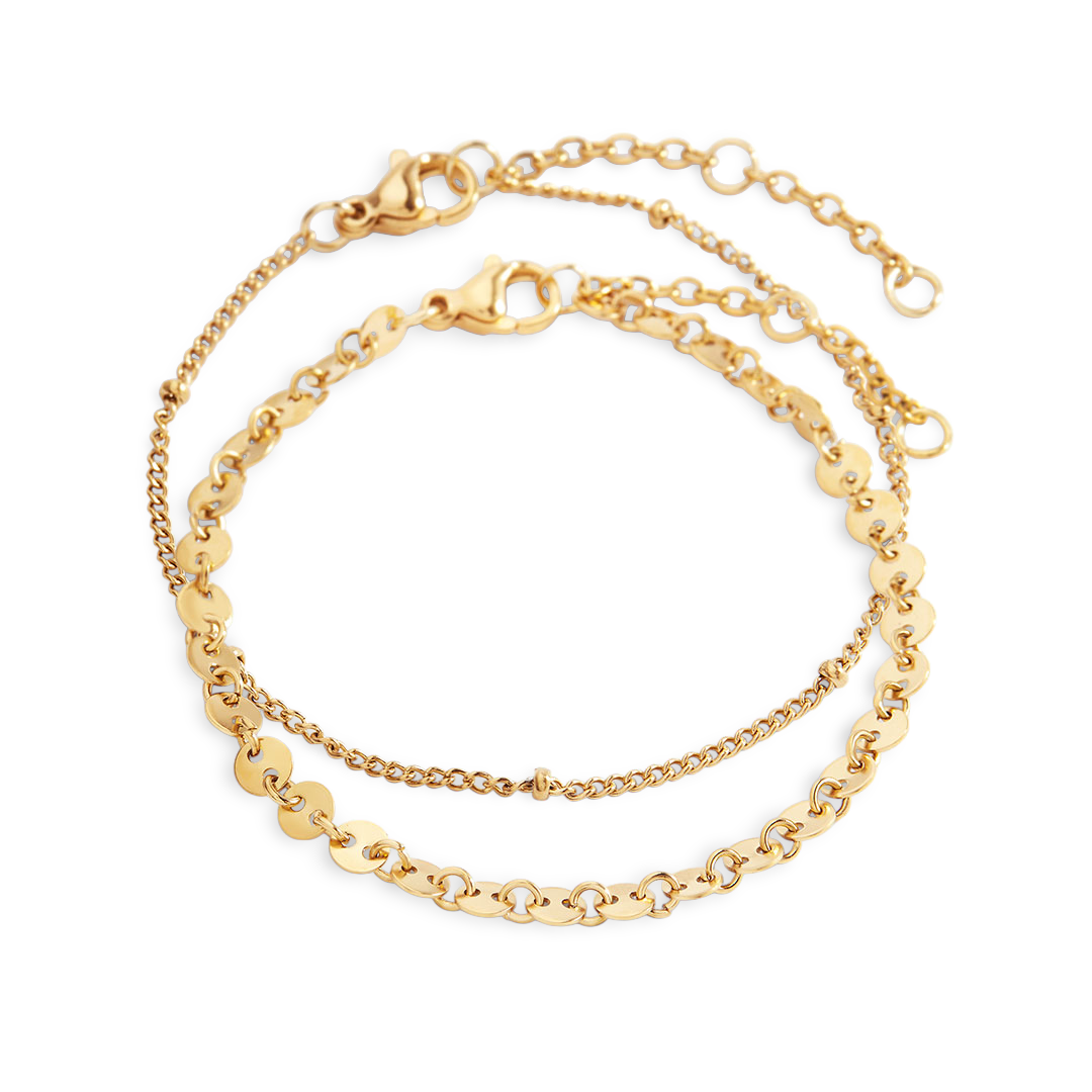 Two gold chain bracelets on a white background