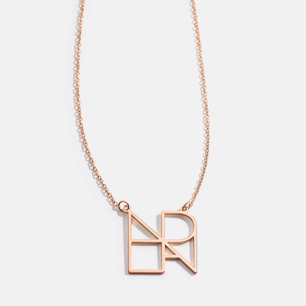 A gold-colored minimalist monogram name necklace featuring the letters 'H' and 'R'.