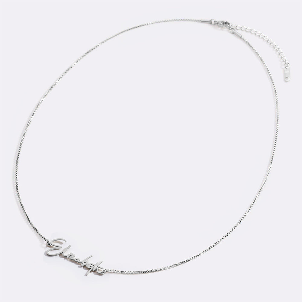 Silver necklace with 'Elizabeth' on a white background