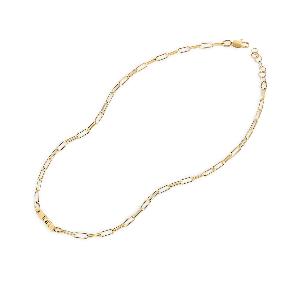 Gold chain necklace on a white background