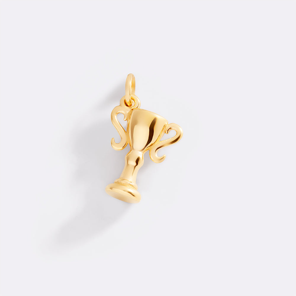 Gold trophy-shaped pendant on a light gray background