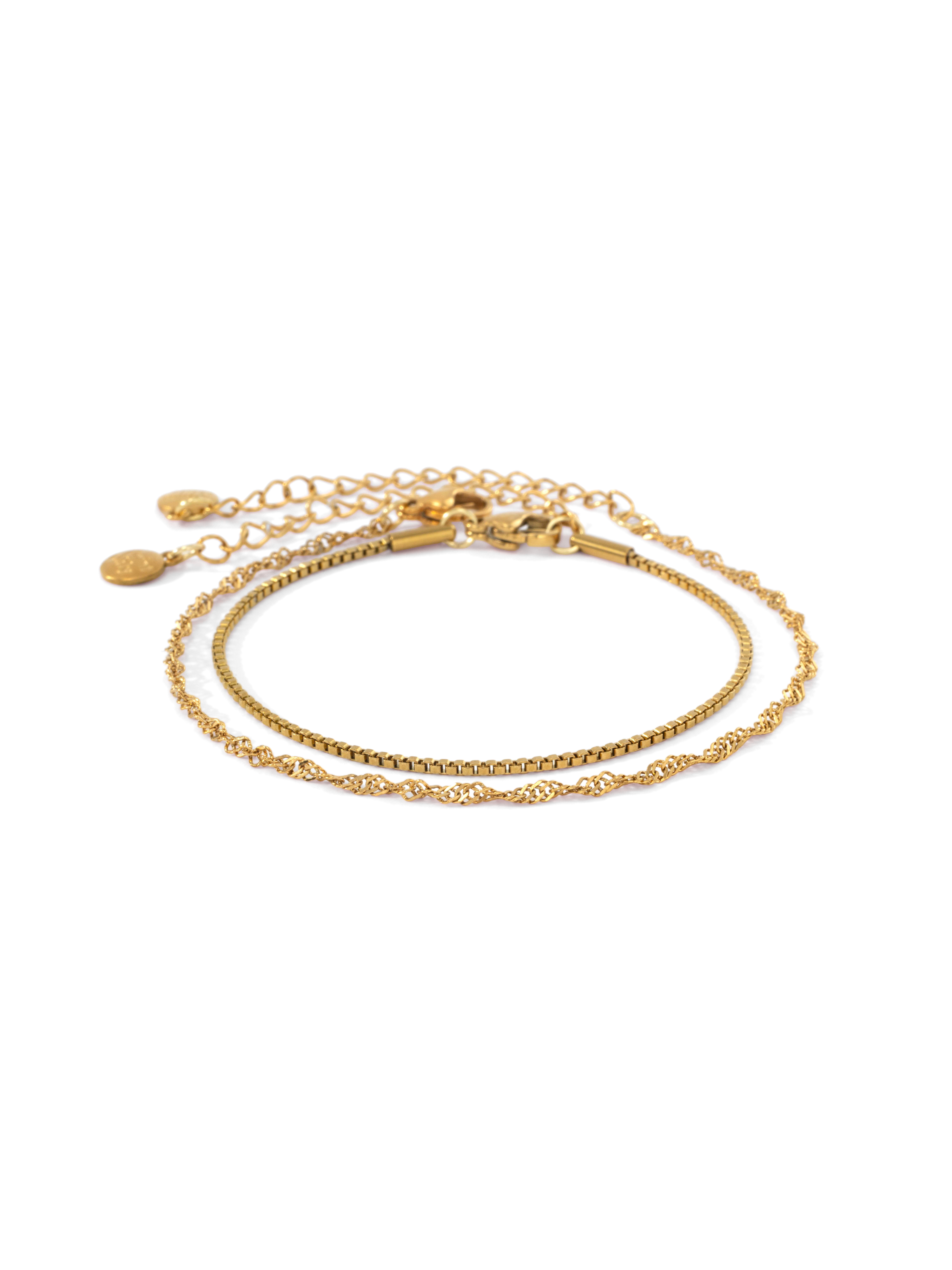 Gold Singapore twist chain bracelet and gold box chain bracelet laid side by side on a white background.