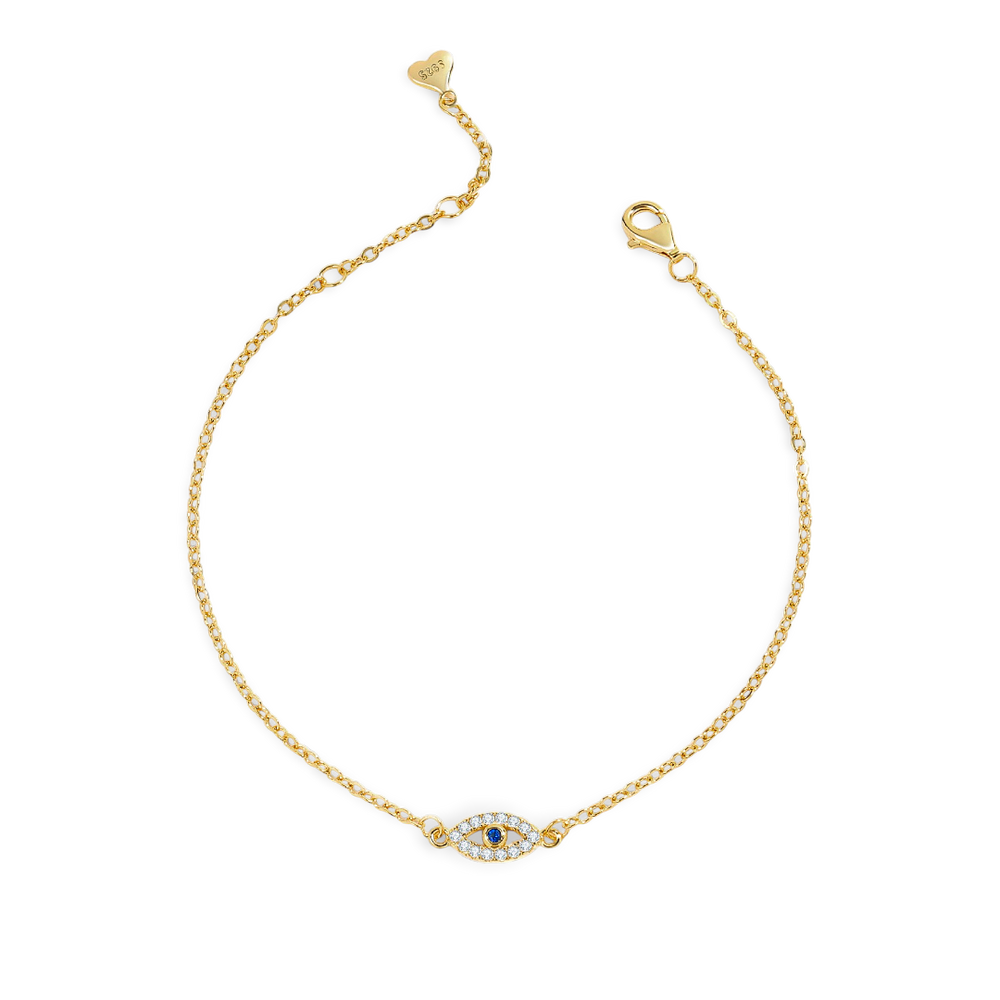 Gold bracelet with a blue gemstone on a light gray background
