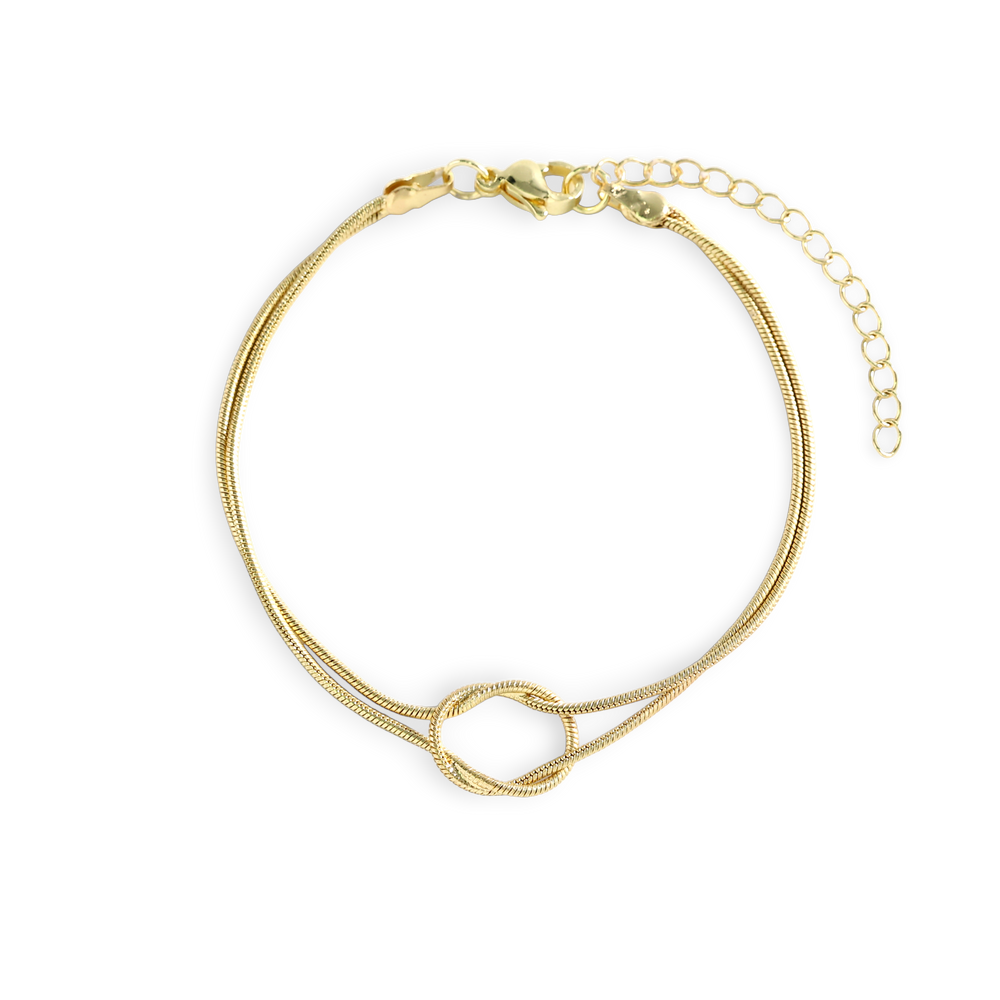 Gold bracelet on a white background