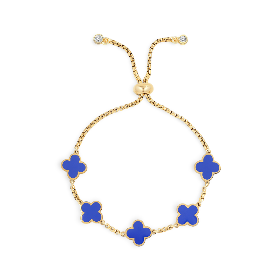 A gold-colored bracelet with navy blue enamel clover charms on an adjustable chain.