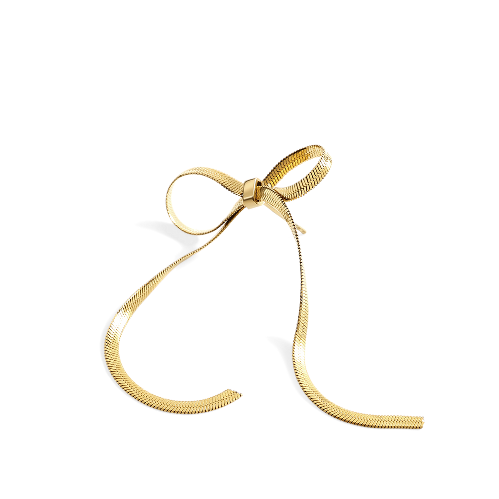 Gold bow-shaped ribbon on a light gray background