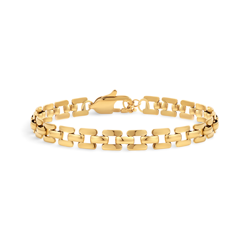 Gold chain bracelet on a light gray background